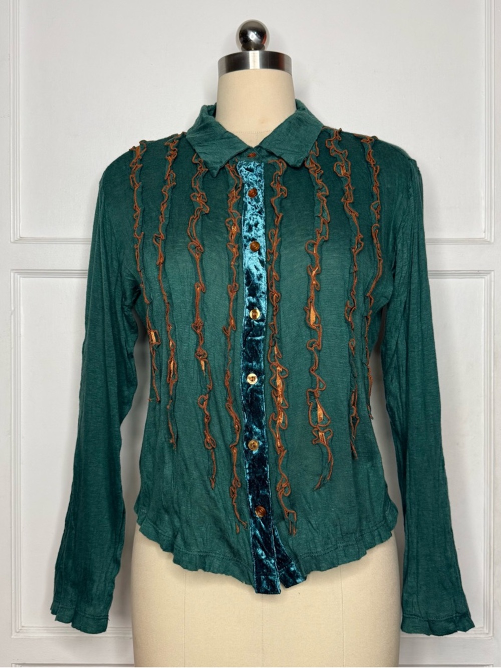 Green ruffle shirt